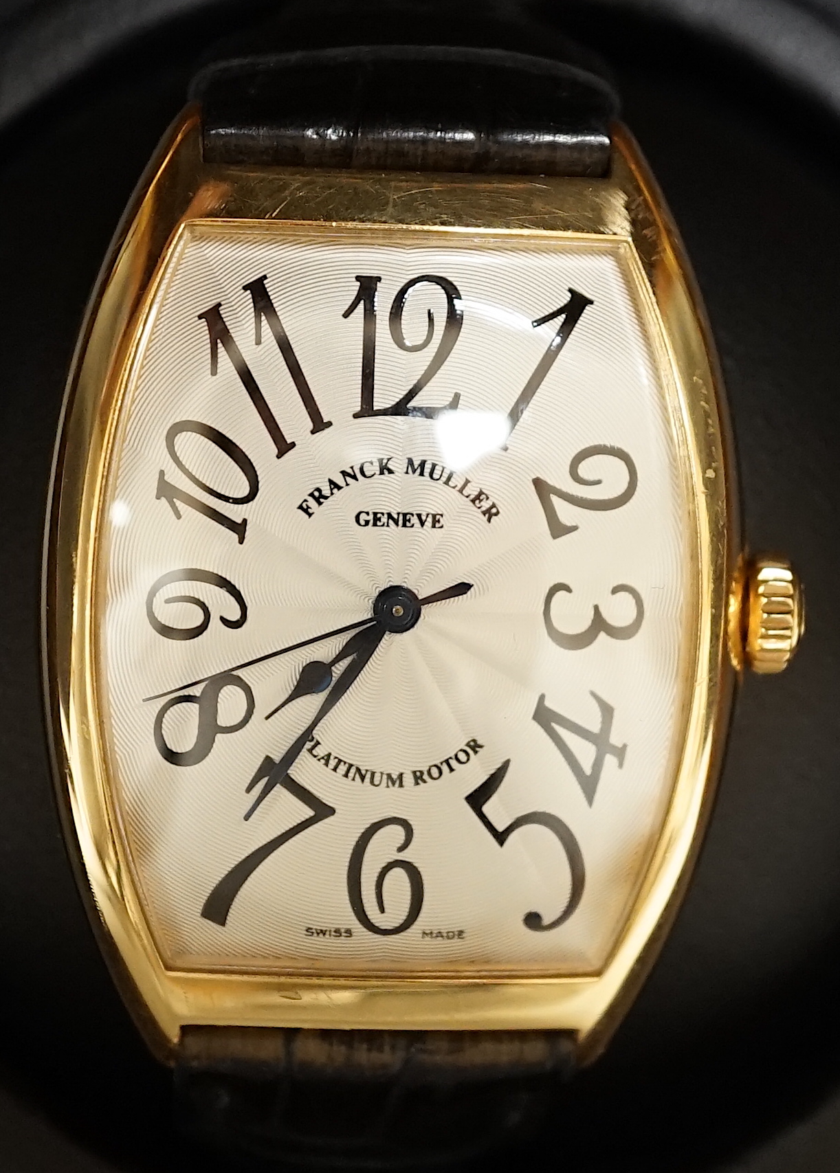 A gentleman's 2005 Swiss 18kt Franck Muller automatic platinum rotor wrist watch, with tumbling Arabic numerals, no.167, case no. 6850 SC, with box and papers, cased diameter 34mm, on a leather strap with 750 clasp.